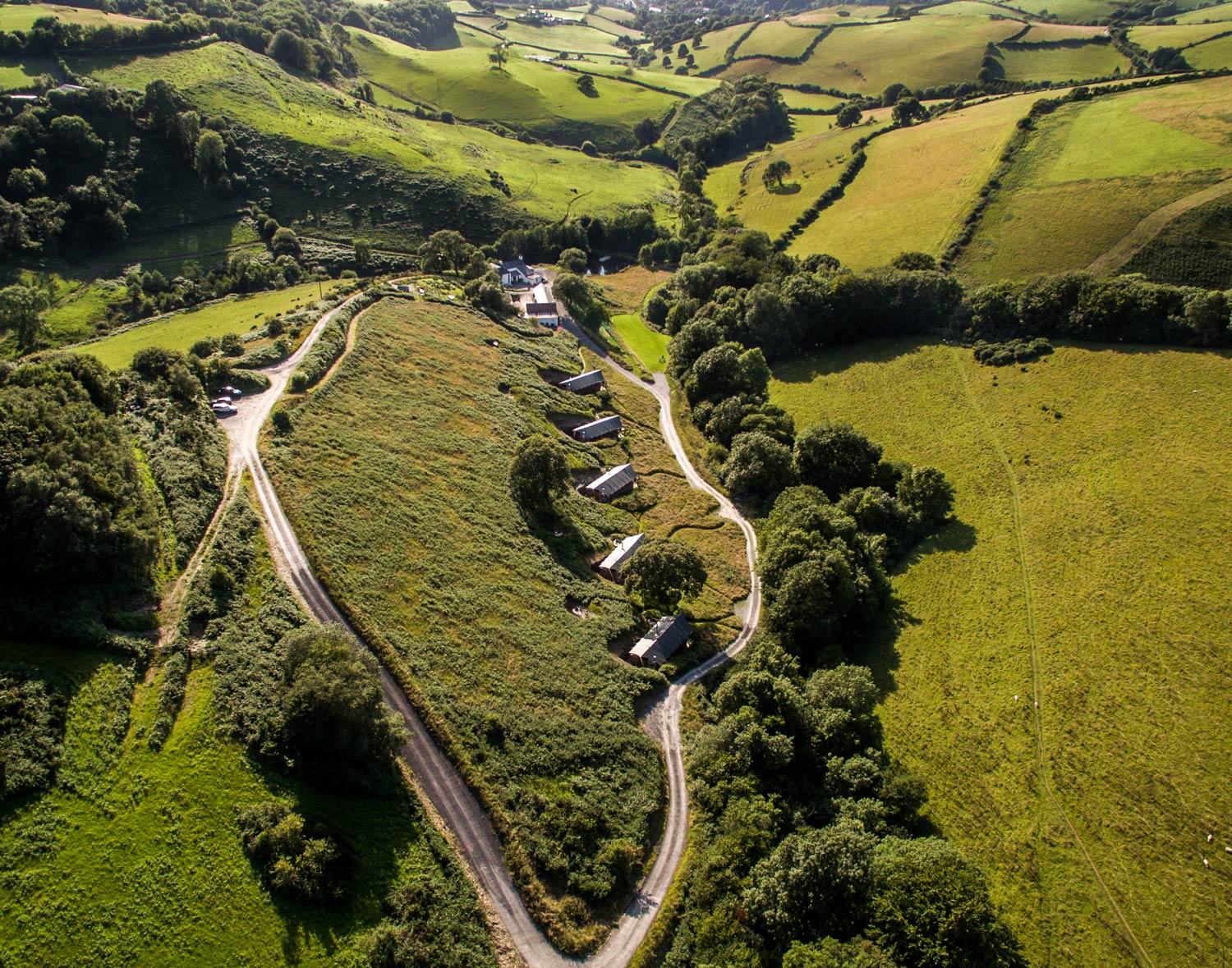 aerial photo of Longlands Luxury Glamping nestled inside the beautiful north devon countryside